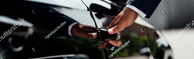 Photo of executive car door being opened